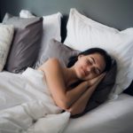 Good dreams make your day better. Attractive young woman sleeping joyfully